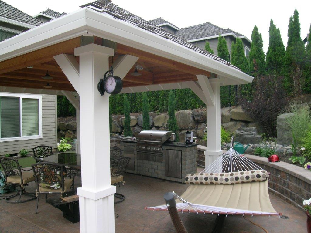 Image of a Wood Village Backyard Kitchen Design and Build by Drake's 7 Dees