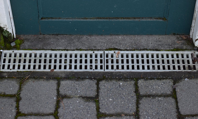 A channel drain to address drainage problems